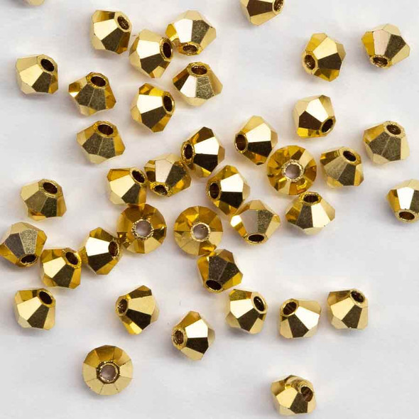 CRYSTAL AURUM 4mm Preciosa Crystal Bicone Beads